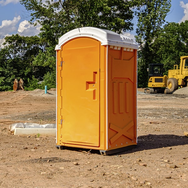 how often are the portable restrooms cleaned and serviced during a rental period in Davis